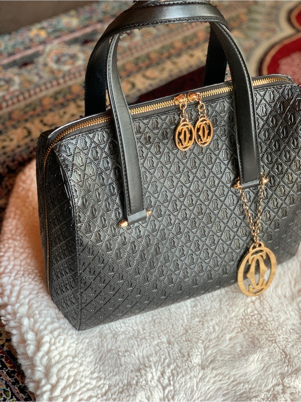Structured Black Quilted Tote Bag with Gold Accents